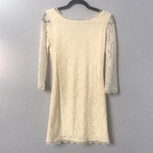 Cream, lace mini dress with full zip back